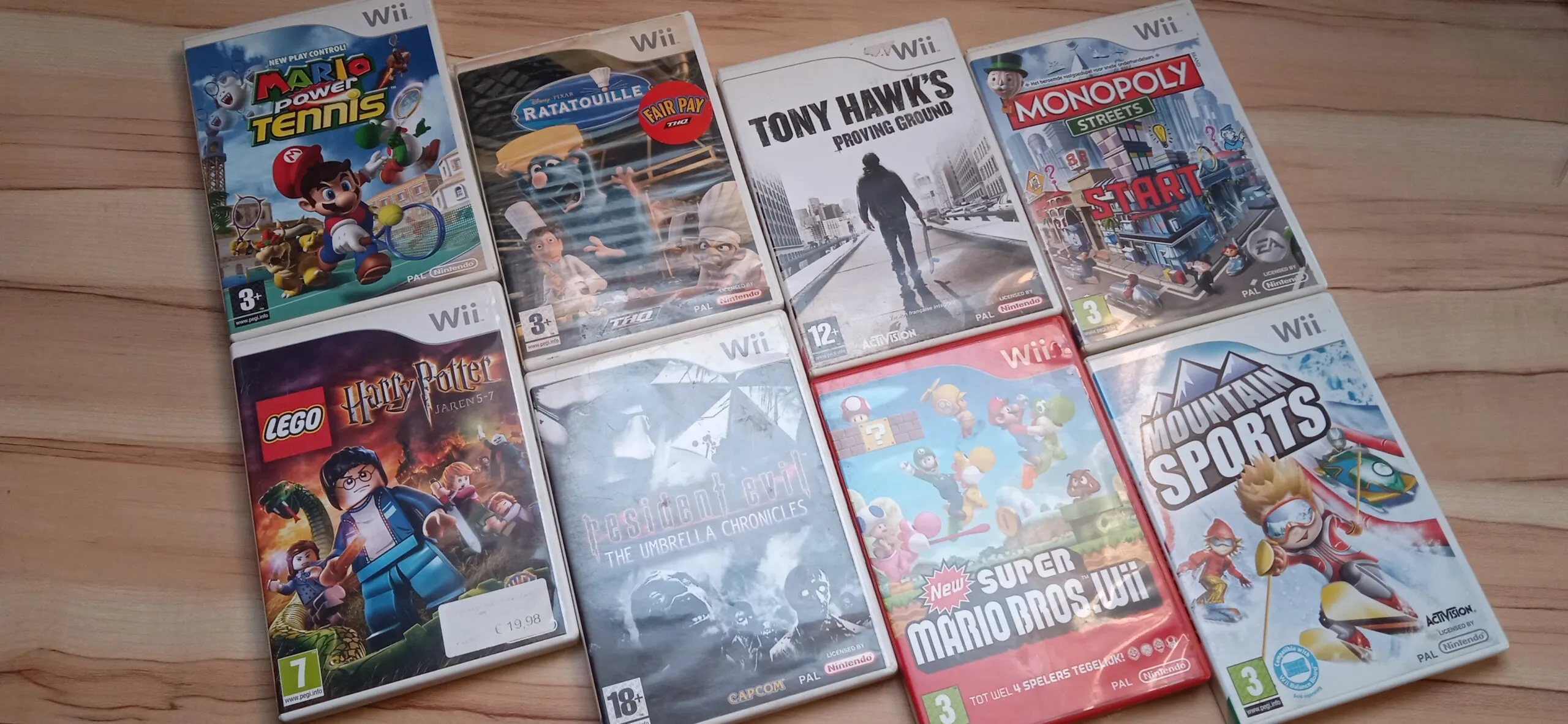 Nintendo Wii + 2 manettes + 2 nunchuks + 8 jeux